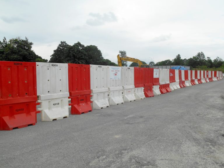 Jersey Barriers Westchester Scaffolding Scaffolding installation on commercial building exterior